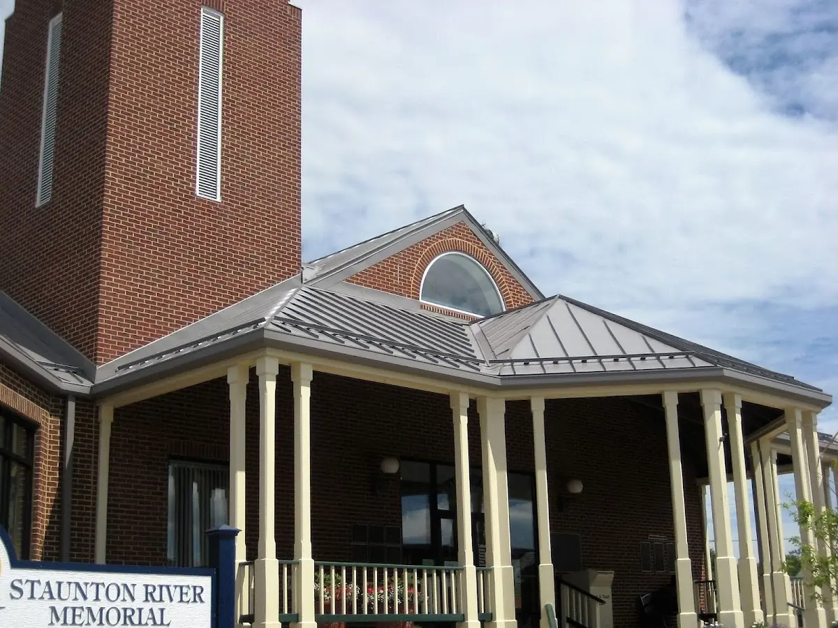 Skilled roofing craftsmen working on a residential roof in Medical Center